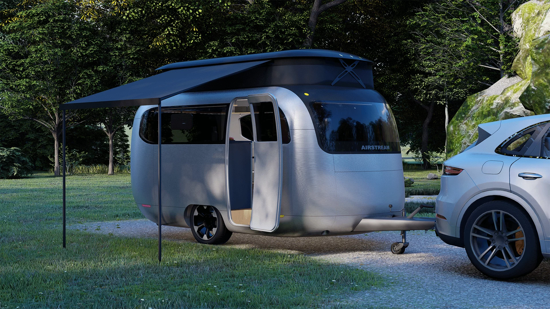 Using a pop-up roof and lowerable suspension, the Airstream concept trailer is low and aerodynamic on the road, roomy at camp and easily stored at home