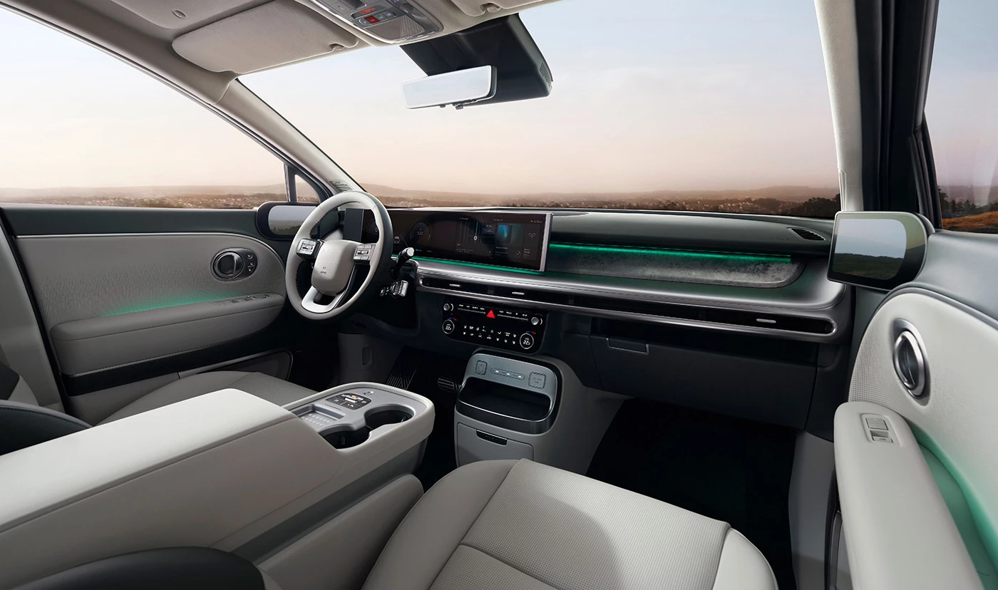 The cabin is packed with thoughtful creature comforts, driving assistance features, screens, and charging ports