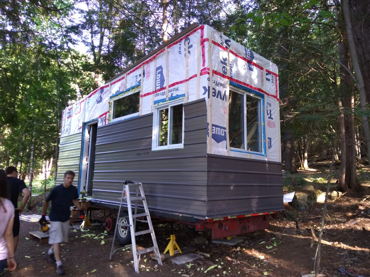 The lightweight metal cladding goes up