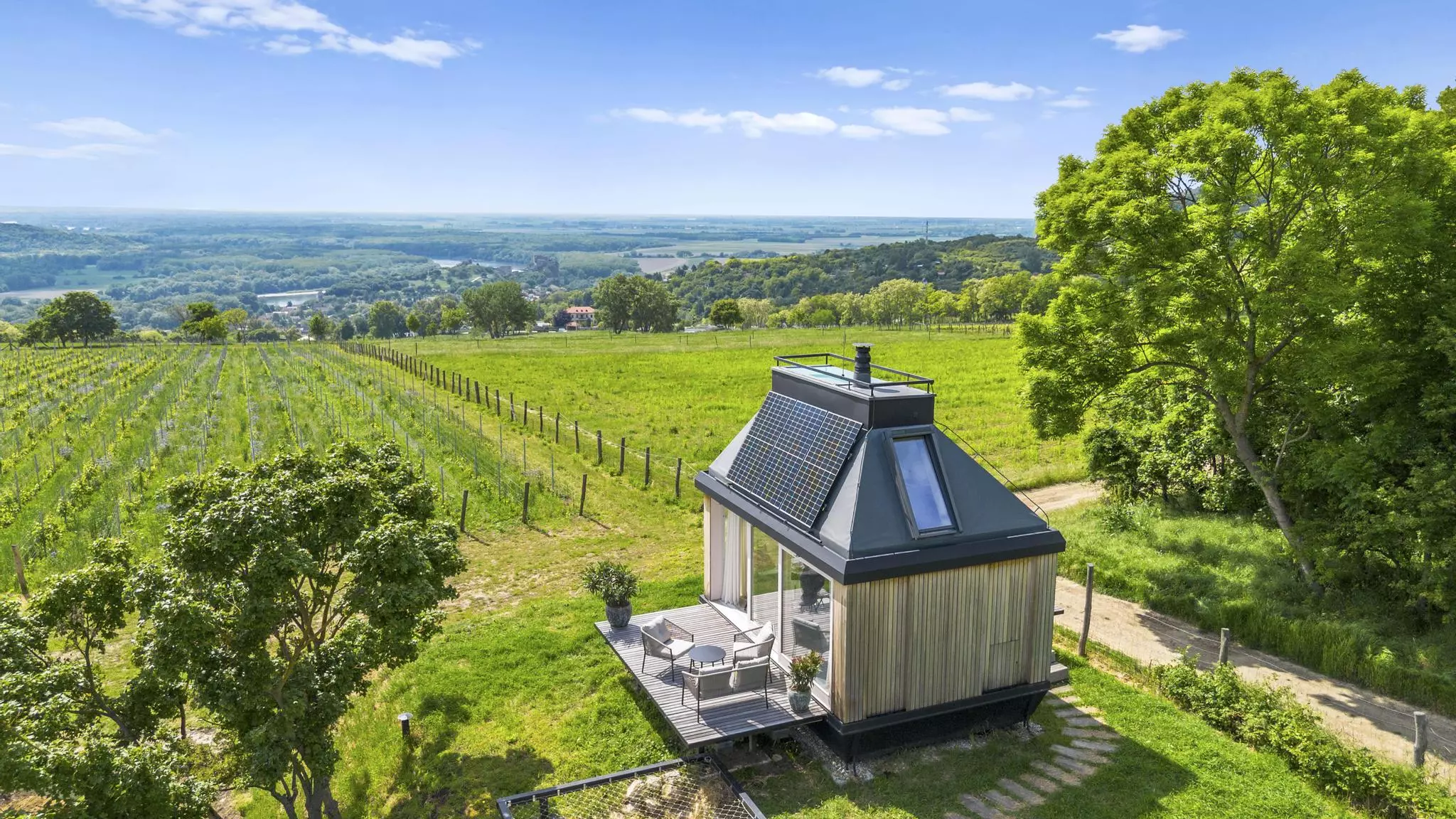 Cabin Devín is a compact tiny house that runs off-the-grid and has a light-filled space-saving layout