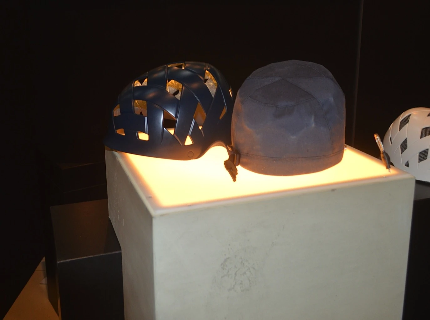 The outer shell secures over top the textile mid-layer