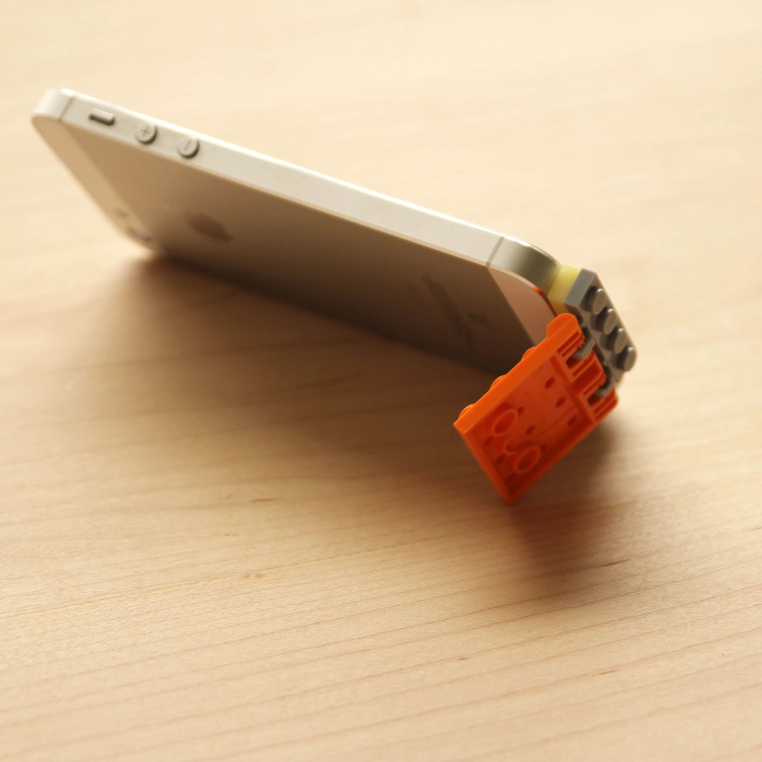 KB's Brick Lightning Cap which will connect Lightning iPhones and iPads to standard Lego bricks