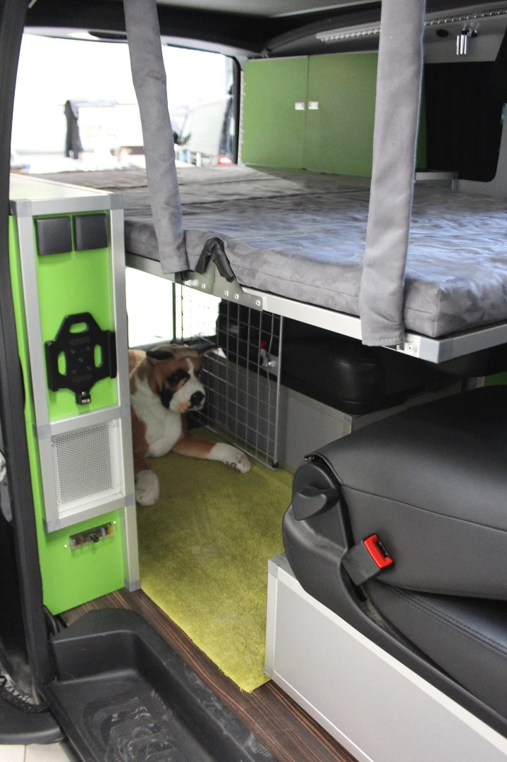 The entire dog pen in the Dogscamper is built below the folding bed so it won't interfere with your sleeping comfort