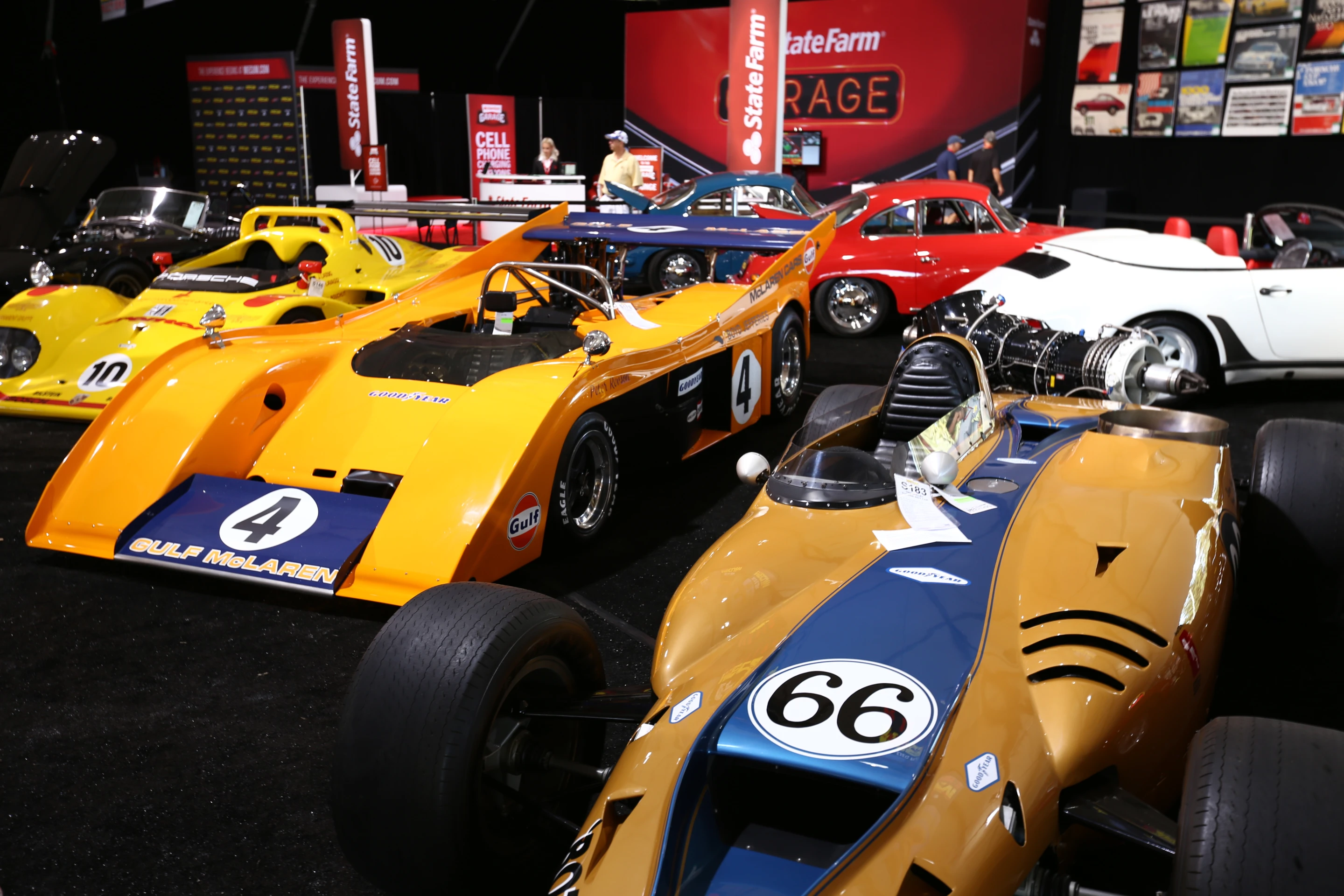 From right to left, a 1968 Shelby Turbine Indy Car 1972 McLaren M20 CAN-AM, 1995 Porsche 962 K8 Spyder inside the ropes at Mecum (Photo: Angus MacKenzie/Gizmag.com)