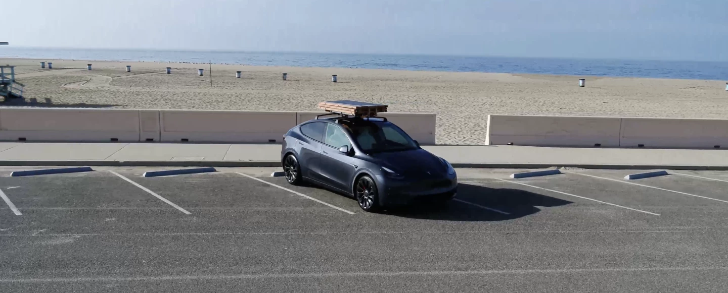 Telescoping tubes within the frame allow the panels to be folded away when it's time to drive