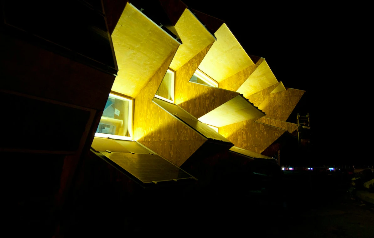 In a neat twist the same protrusions act as solar barriers during summer when the sun tracks a higher course across the sky, but let sunlight directly in during winter