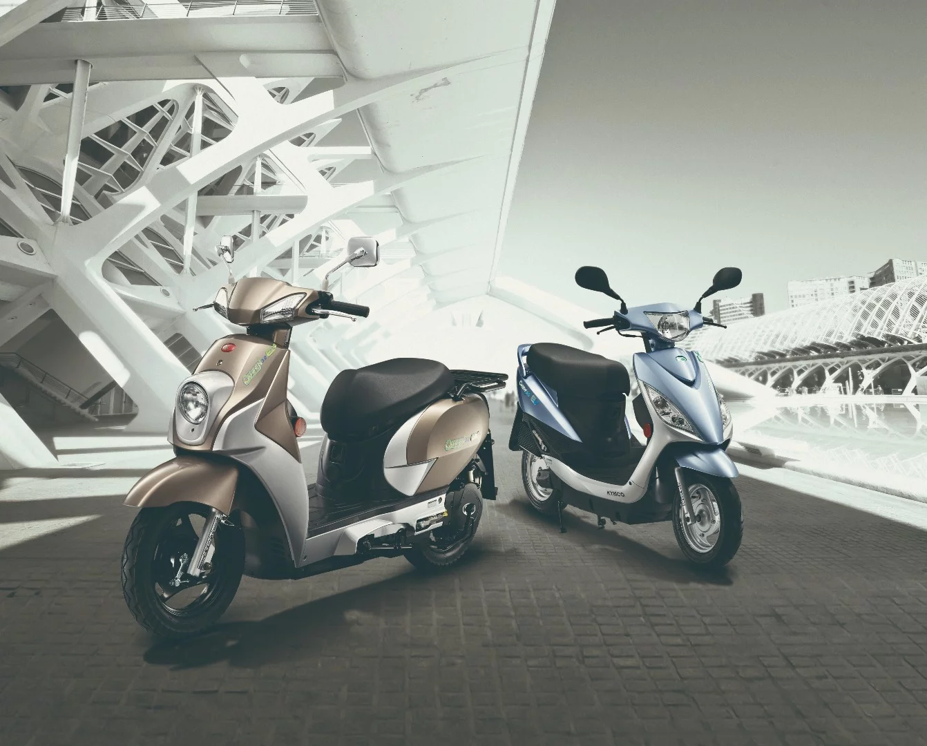 In Europe, KYMCO has already on offer two electric scooters, the Queen (left) and the Candy – although these do not rely on the Ionex power architecture yet