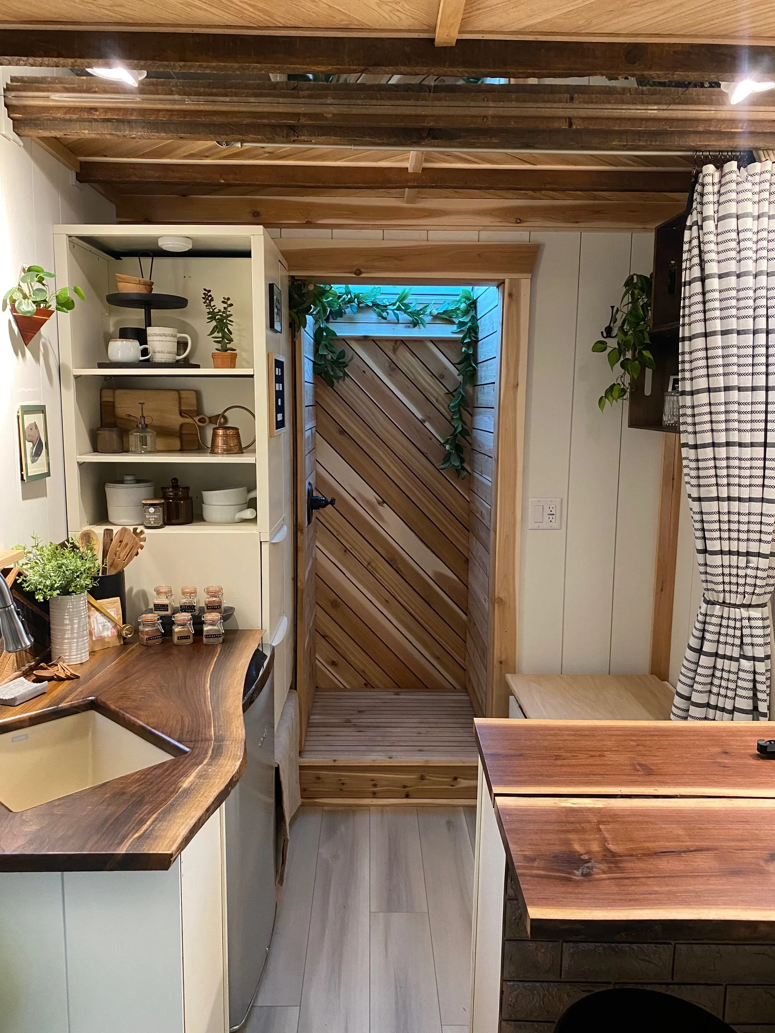 The interior design is complimented with warm oak and cedar panels