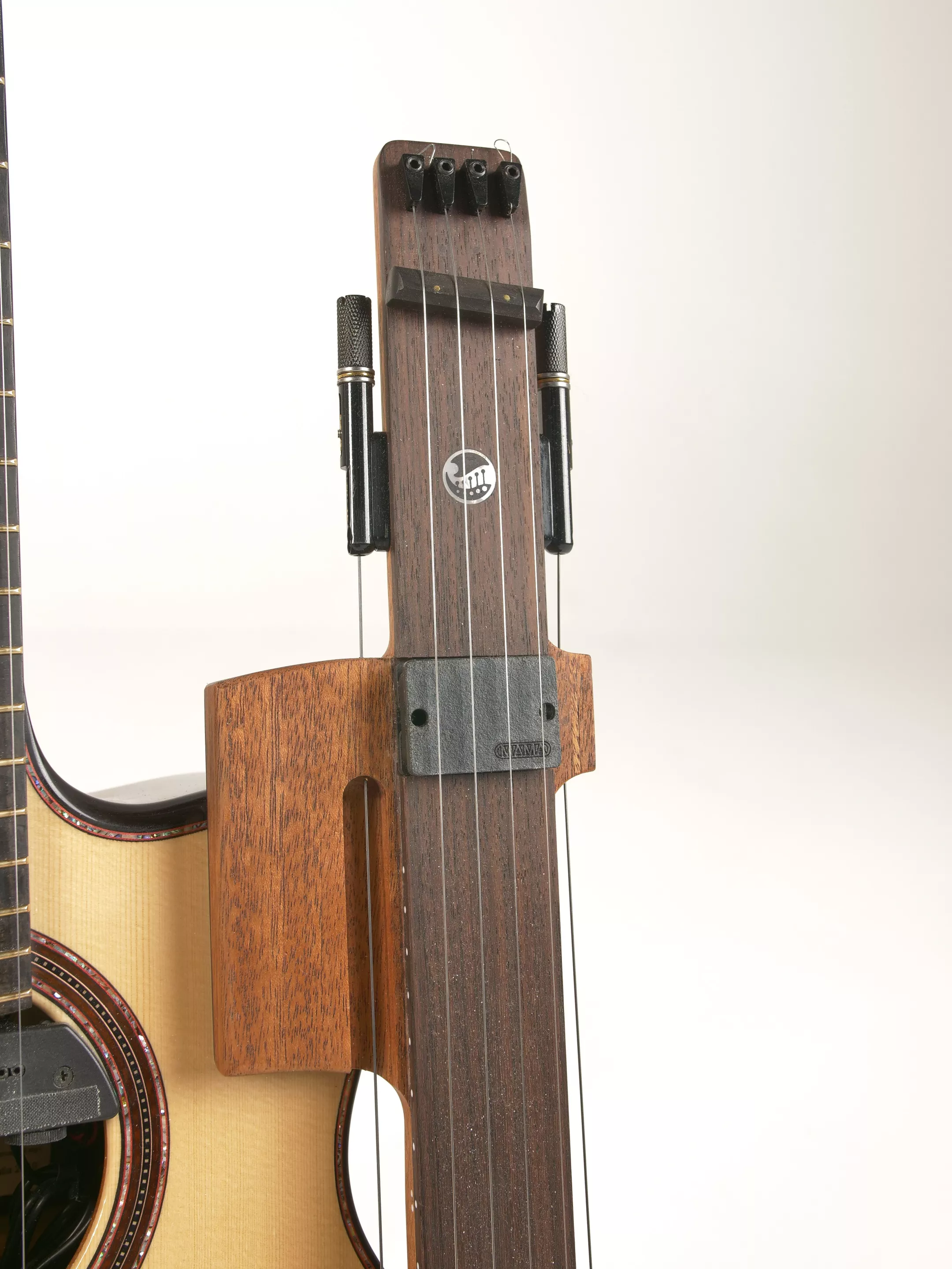 The Reversed Slide Neck is set up so that high notes are to the top and low notes are at the bottom, the opposite of the host guitar