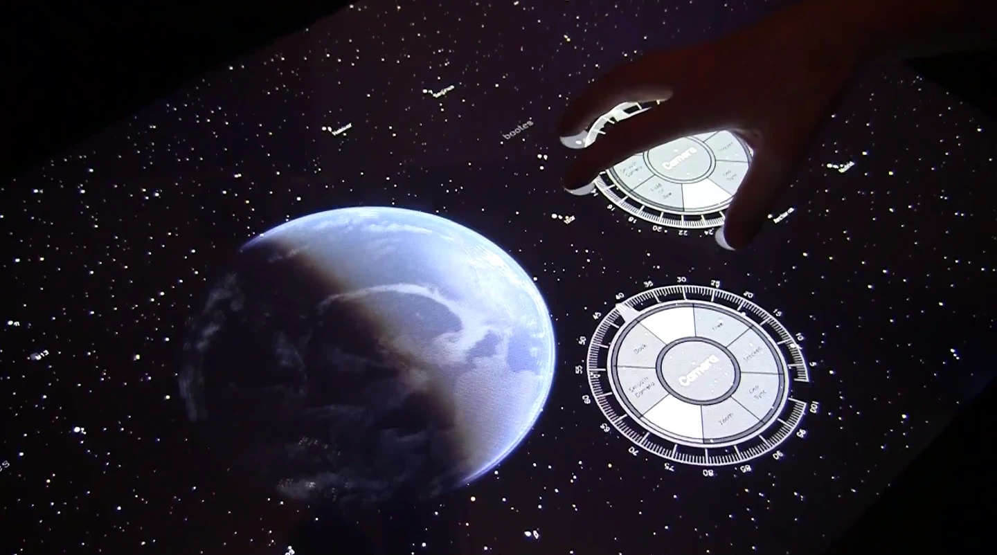 Microsoft Surface researcher David Brown is working on a marvelous space app that shows of not only the multi-touch power of Microsoft Surface, but also the computational grunt of the Samsung SUR40 on which it runs (Image: David Brown/Microsoft)