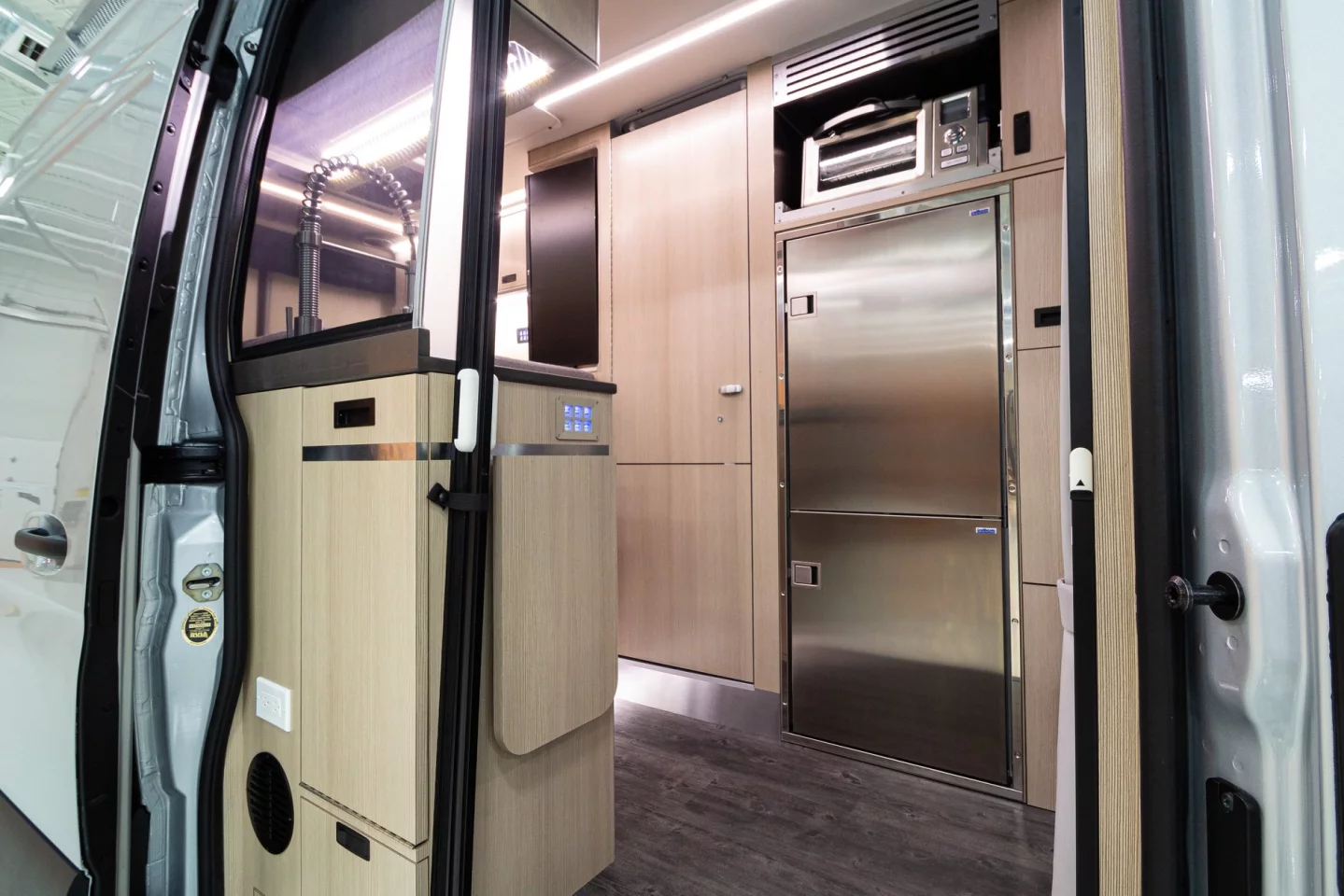 A look inside at the large Isotherm fridge and Cuisinart steam oven