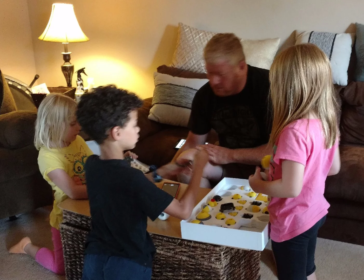 Amazingly cooperative, the kids are intent on building the Big M from the Mabot box's cover. Who am I to say no to that?