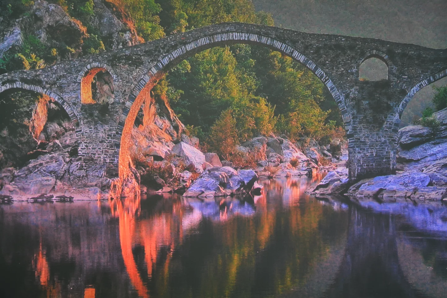 System screensaver thrown onto a matte white projector screen in front of a partially shaded window during daylight hours (photo straight from the camera, no post processing)