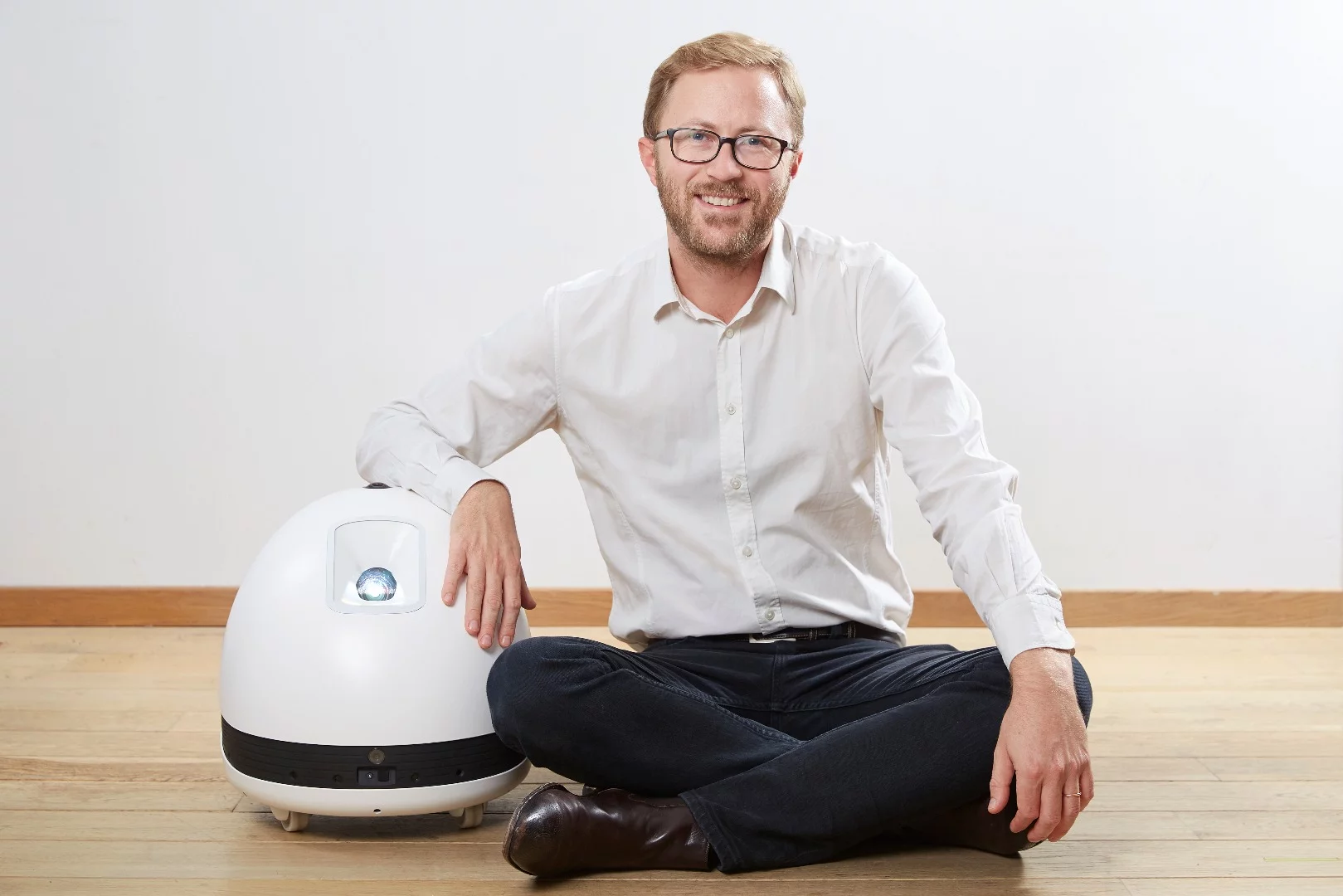 Ex-Googler Pierre Lebeau with his new robot pal, Keecker