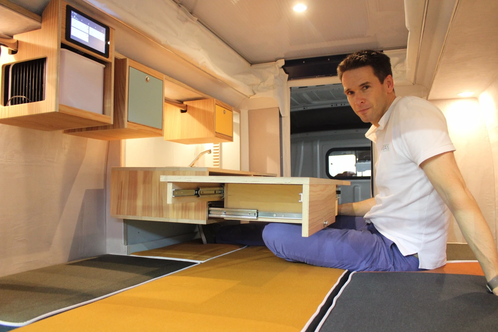 The PlugV lift-up kitchen block lets you prepare food and eat in bed