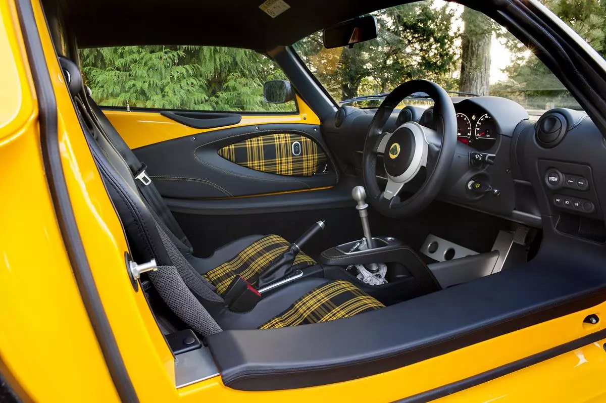 As with the Lotus Elise Sport, the Exige Sport also has a heritage theme trim with lightweight sport seats and door panels clad in red or yellow tartan