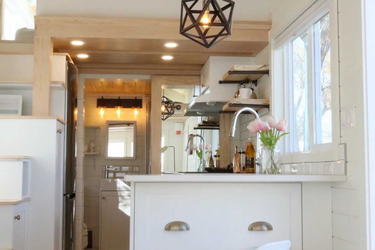 The Innisfree Anarres' kitchen connects to the bathroom
