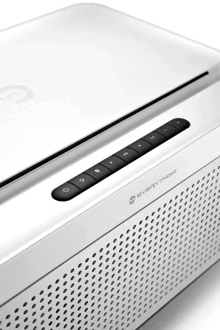 Up top there's a groove for slotting in a tablet or smartphone for hands-free viewing and a line of playback and volume control buttons