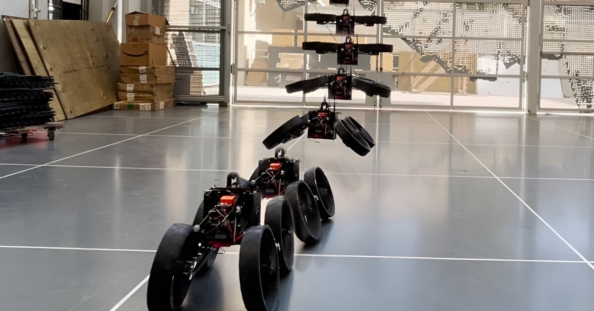 Flying robot morphs mid-air to land and roll on wheels Flying robot morphs mid-air to land and roll on wheels