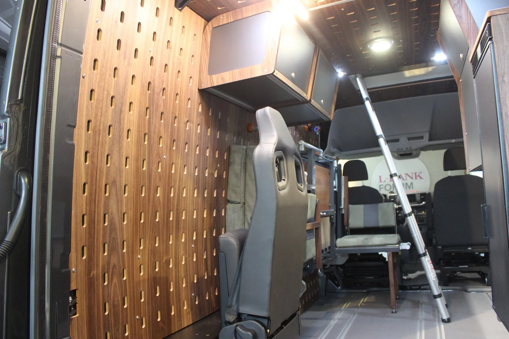 The rear seat in this Mountain 4x4 folds and swivels out of the way