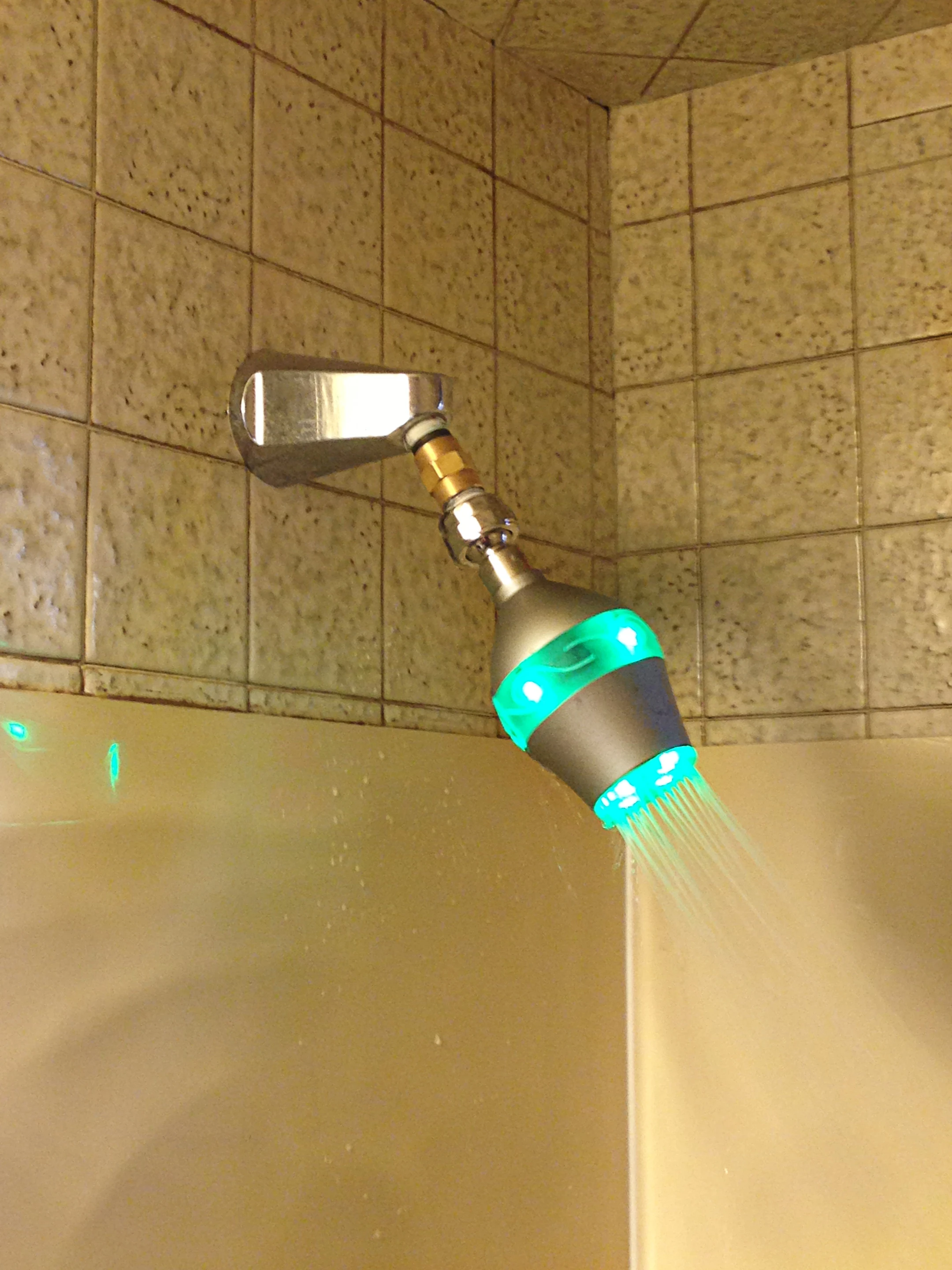 The Uji shower head starts out green, and gradually changes to red