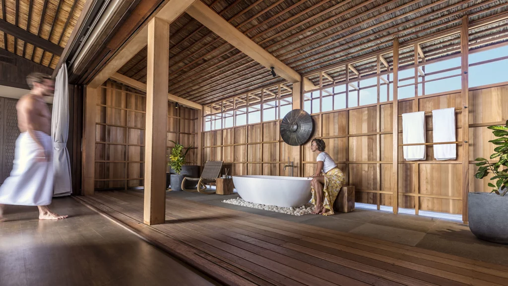 Each private villa includes an open bathroom and handmade furniture