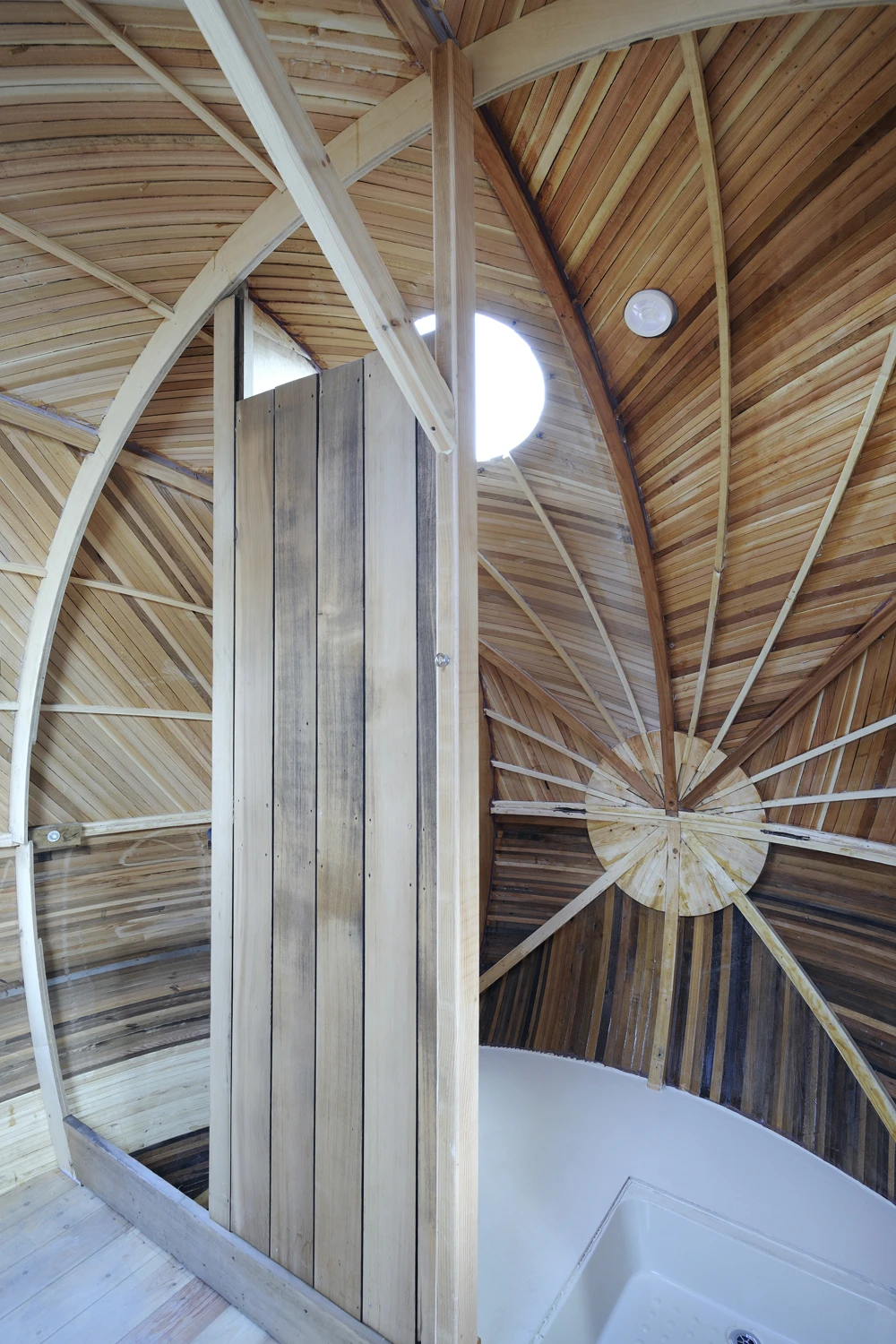 The interior contains a desk area, hammock, and kitchen, which itself sports a paraffin stove and sink (Photo: Nigel Rigden)