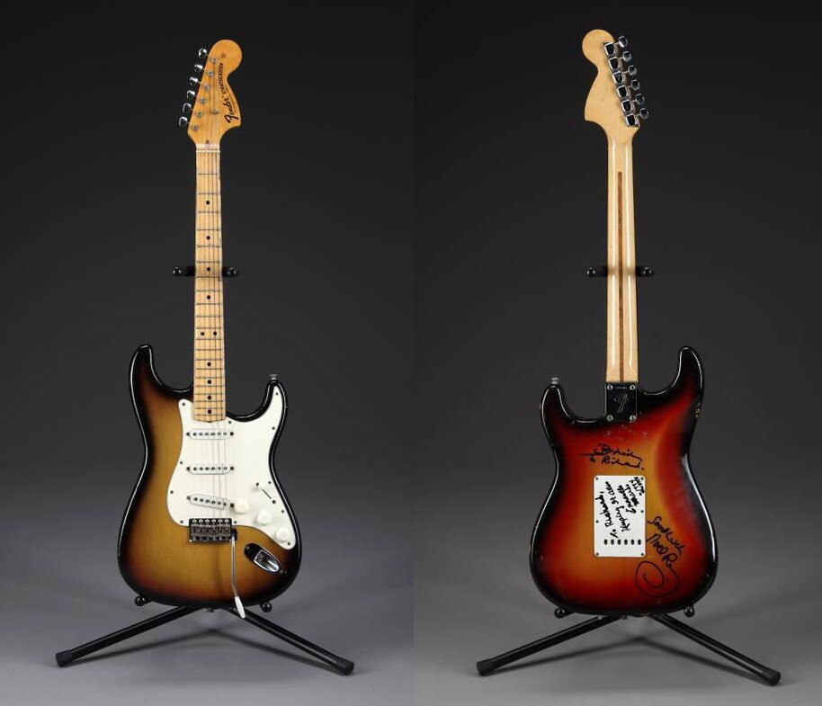 Sunburst Fender Stratocaster purchased by Hendrix at Manny's Musical Instruments in New York on 14 July, 1970, when he was recording in his new Electric Lady Studios. Hendrix passed away two months later but was known to have been working in his studio for 10 days of those two months on his posthumous album "The Cry of Love." The guitar has been restrung for left-handed play and is the guitar used by Hendrix at the opening party for Electric Lady Studios in August 1970. It sold for $187,500 at a Juliens auction on 24 June, 2010