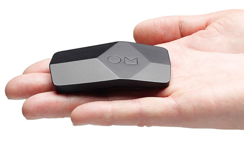The black box, when clipped to the smart shirt, transfers biometric data via Bluetooth to the OMsignal companion app