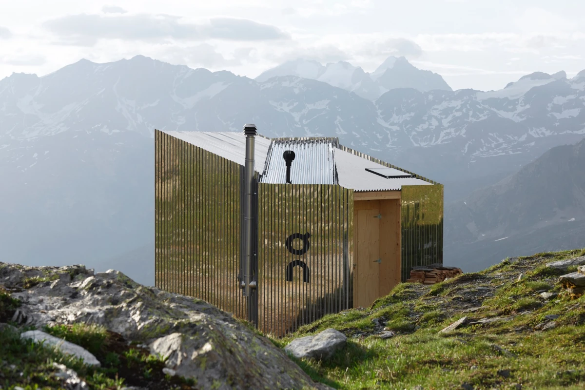 The On Mountain Hut runs off-the-grid, with roof-based solar panels providing power for the interior lighting