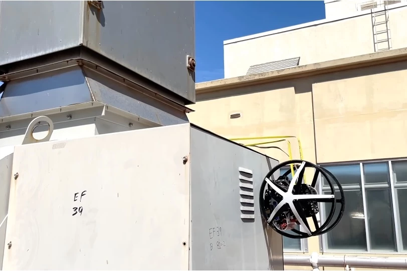 The EEWOC does the ol' reach-around to make its way up and over a ledge