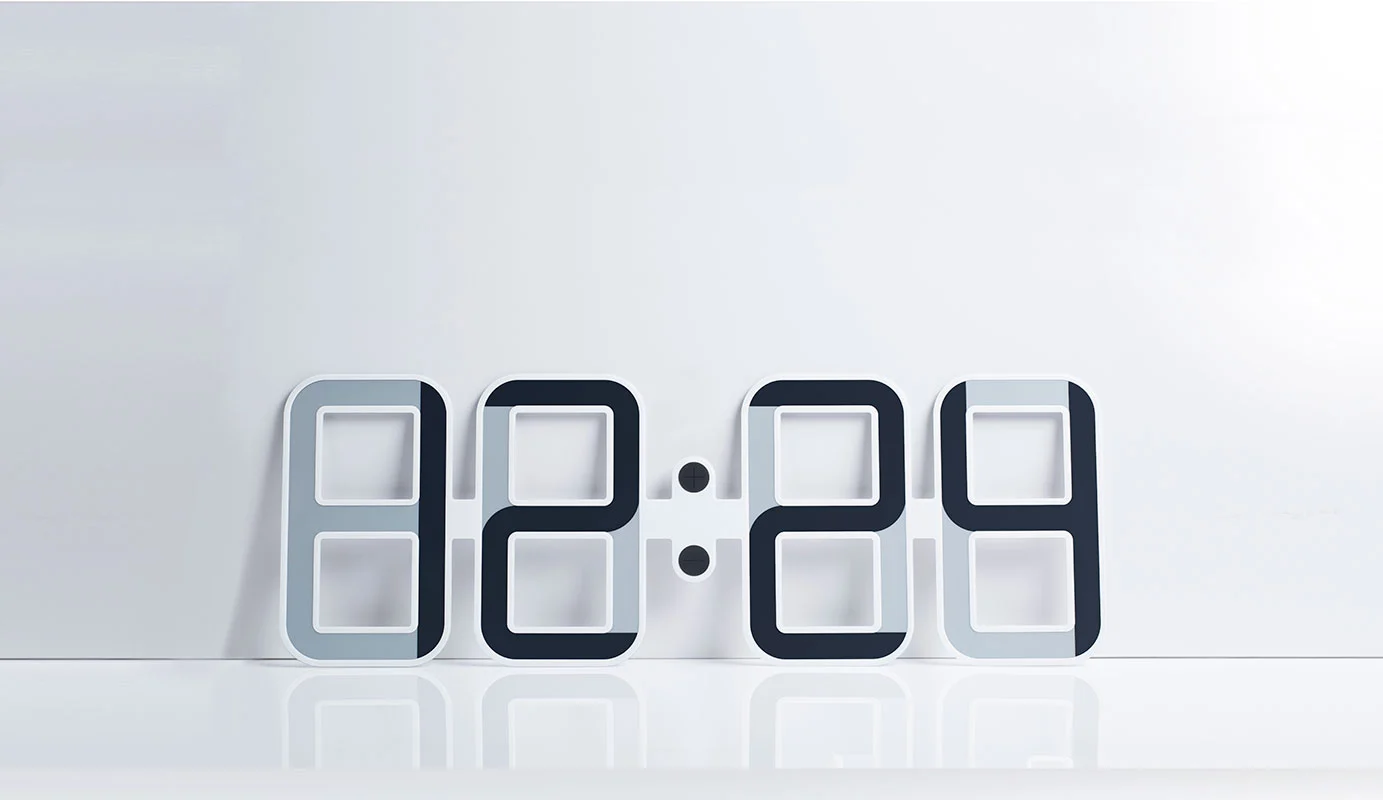 The ClockONE hangs on the wall using a magnetic mounting system