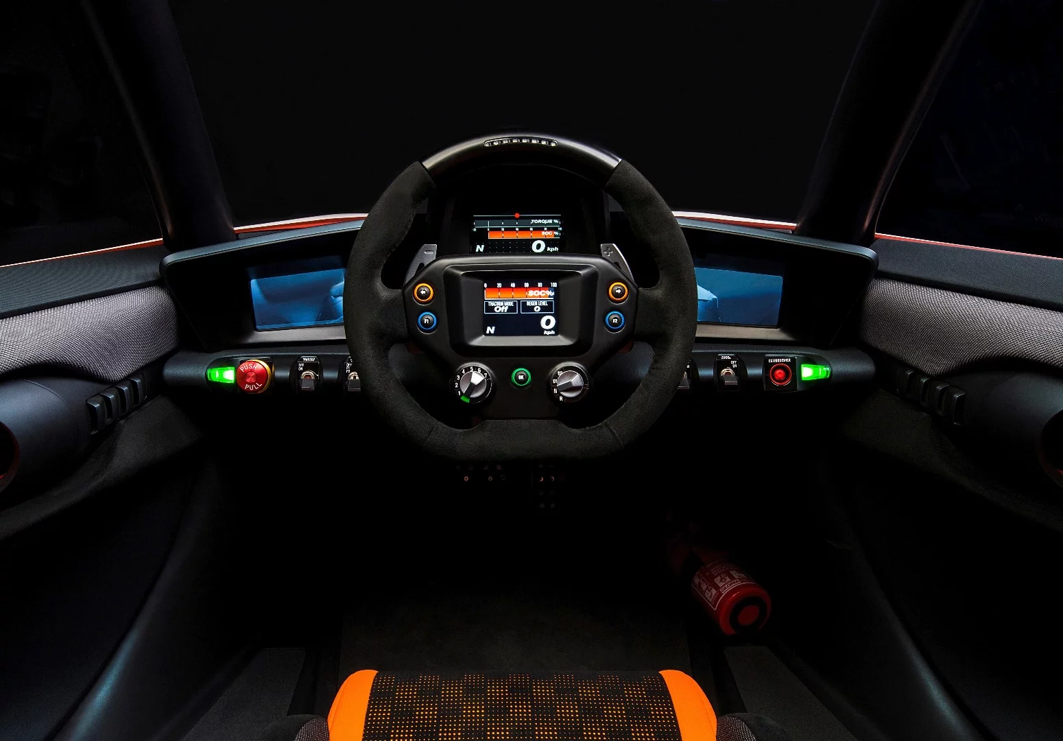 The steering wheel has all of the car’s driver information displays packed into it with a large central LCD screen blanked by buttons and selectors in apparent homage to Formula racing