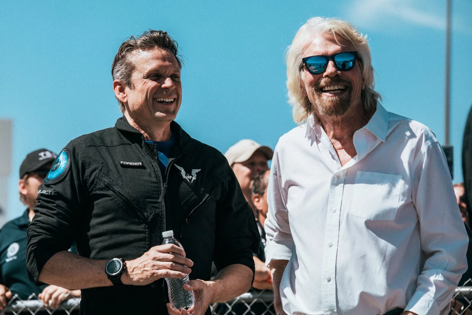 Richard Branson and Virgin Galactic pilot Mark "Forger" Stucky debrief after the second powered test flight
