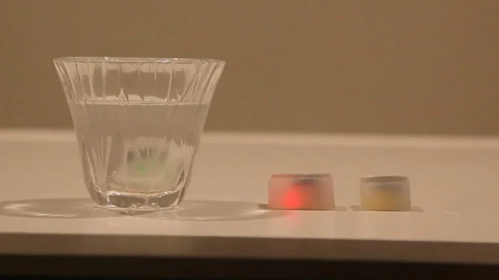 Each cube is comprised of a colored LED, an accelerometer, IR receivers, and a battery, which are molded into an edible, waterproof jelly
