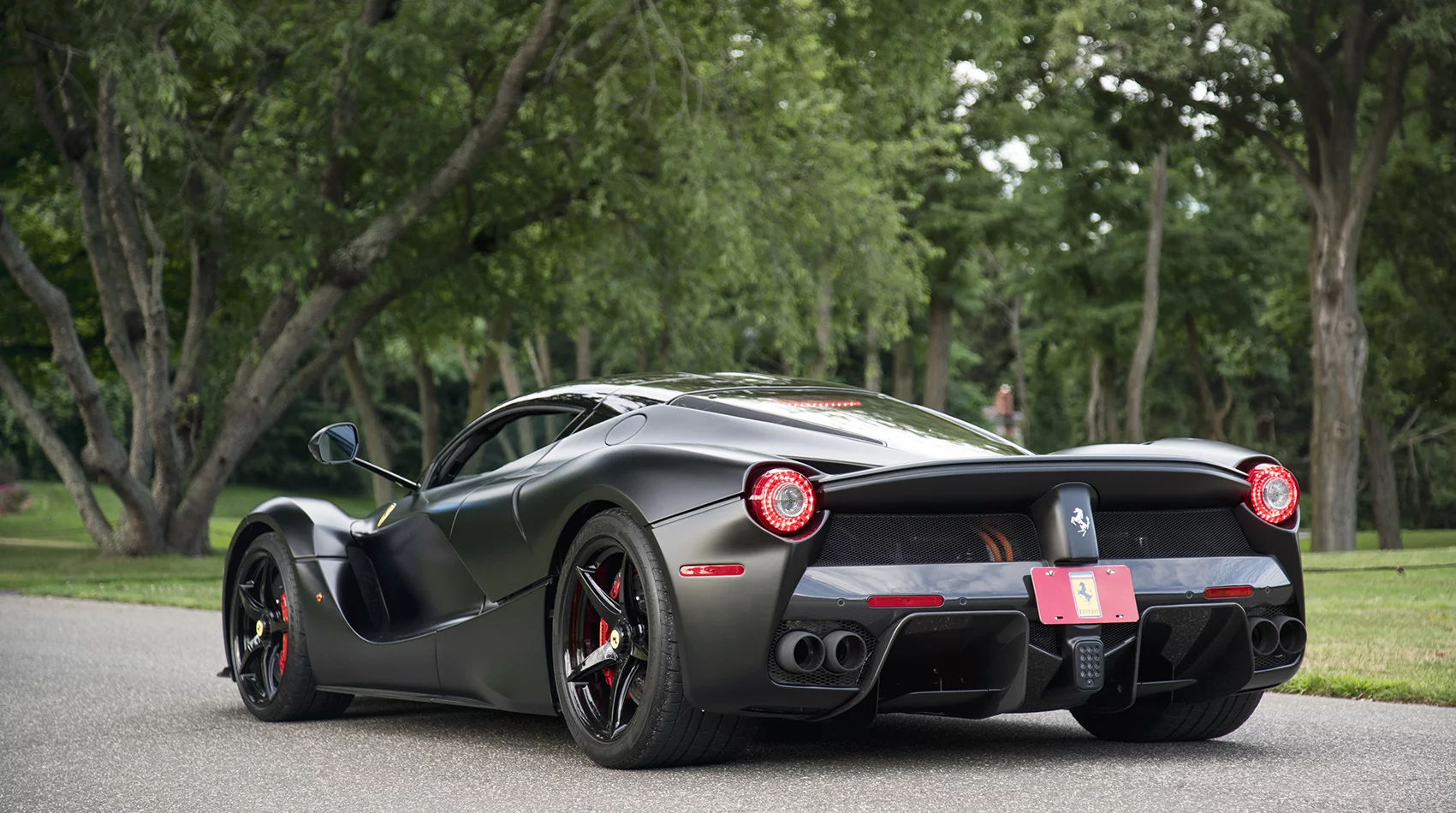 In black on black, this isn't your average Ferrari paintjob