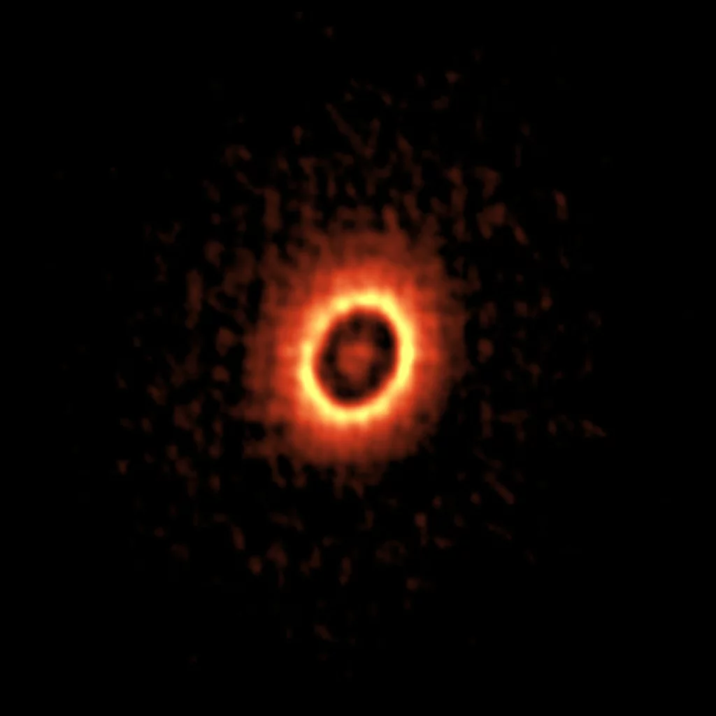 An ALMA image of DM Tau, with its two dust disks clearly visible