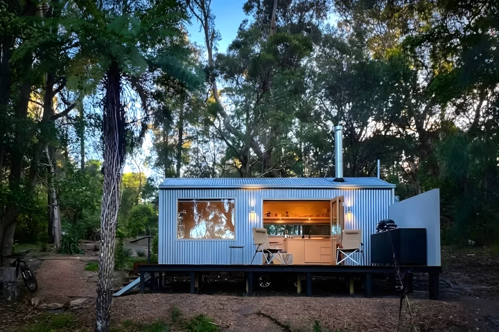 The Zinc Studio Cabin features a corrugated metal exterior that's inspired by agricultural sheds