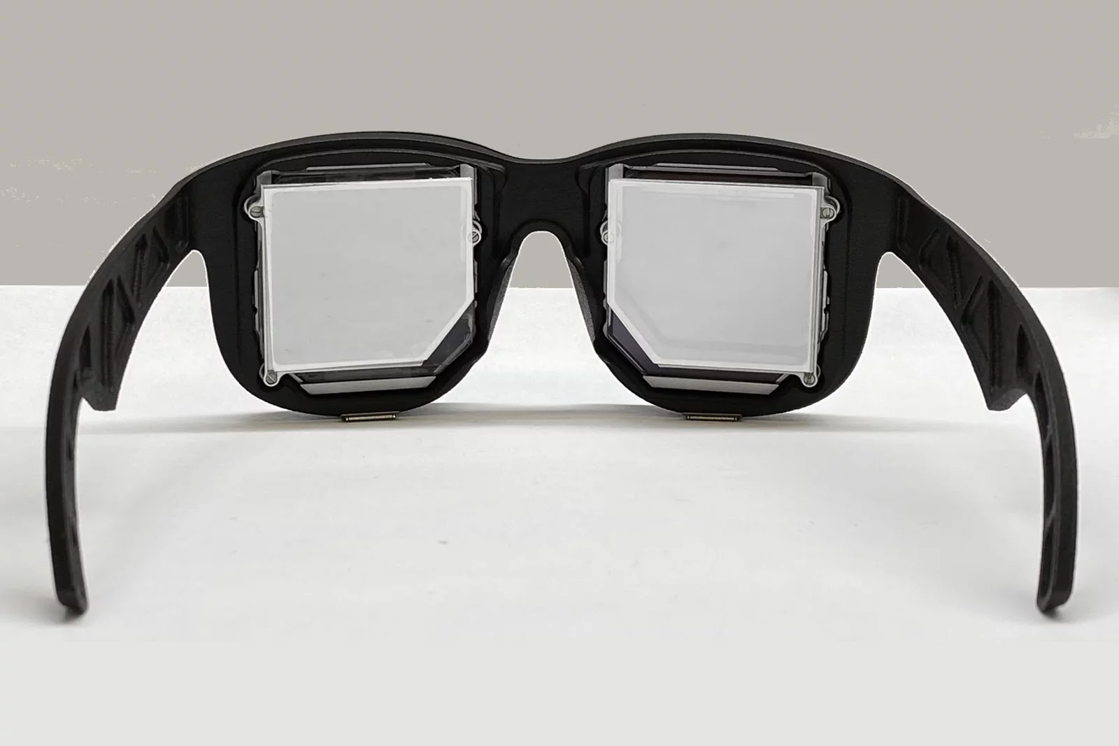 Facebook's prototype uses holographic techniques and optical folding