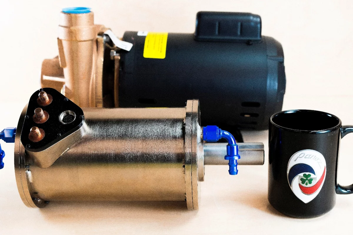 The DHX Falcon, at front, produces 80 hp and is equivalent to the typical automotive electric motor shown behind, yet is 75 percent less bulky