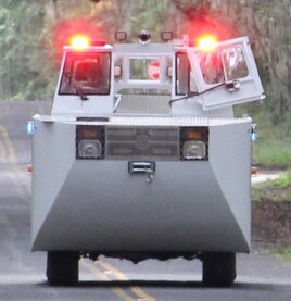 The Amphibious Responder's squared off bow was designed to push off debris