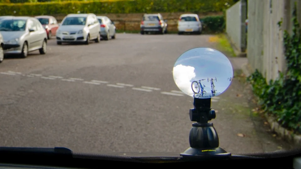 The RoofScope mounts on the hood, and is viewed from the driver's seat