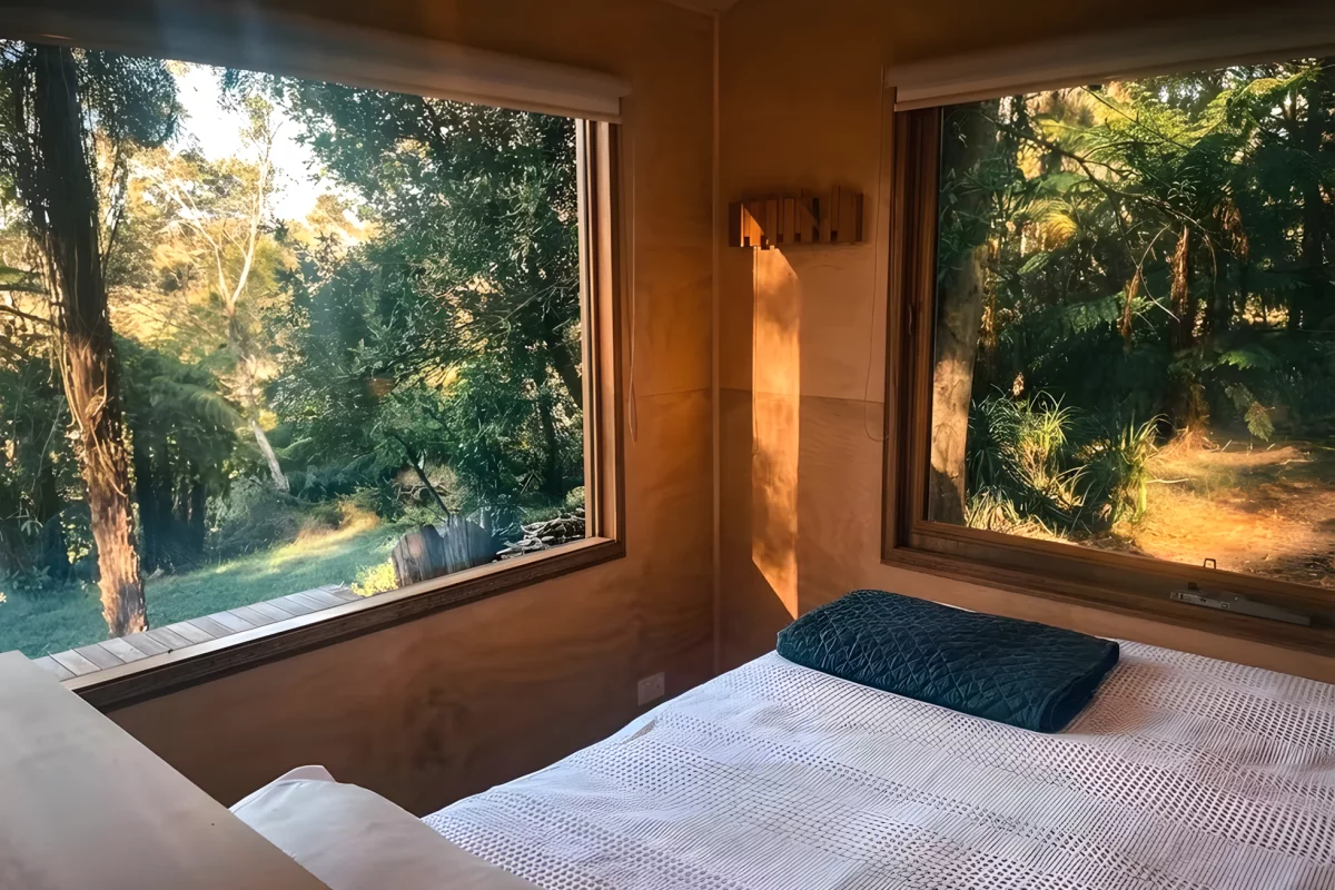 The Zinc Studio Cabin's bedroom includes a double bed and has ample headroom to stand upright