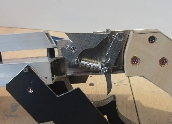 The BB crossbow's latching mechanism and trigger