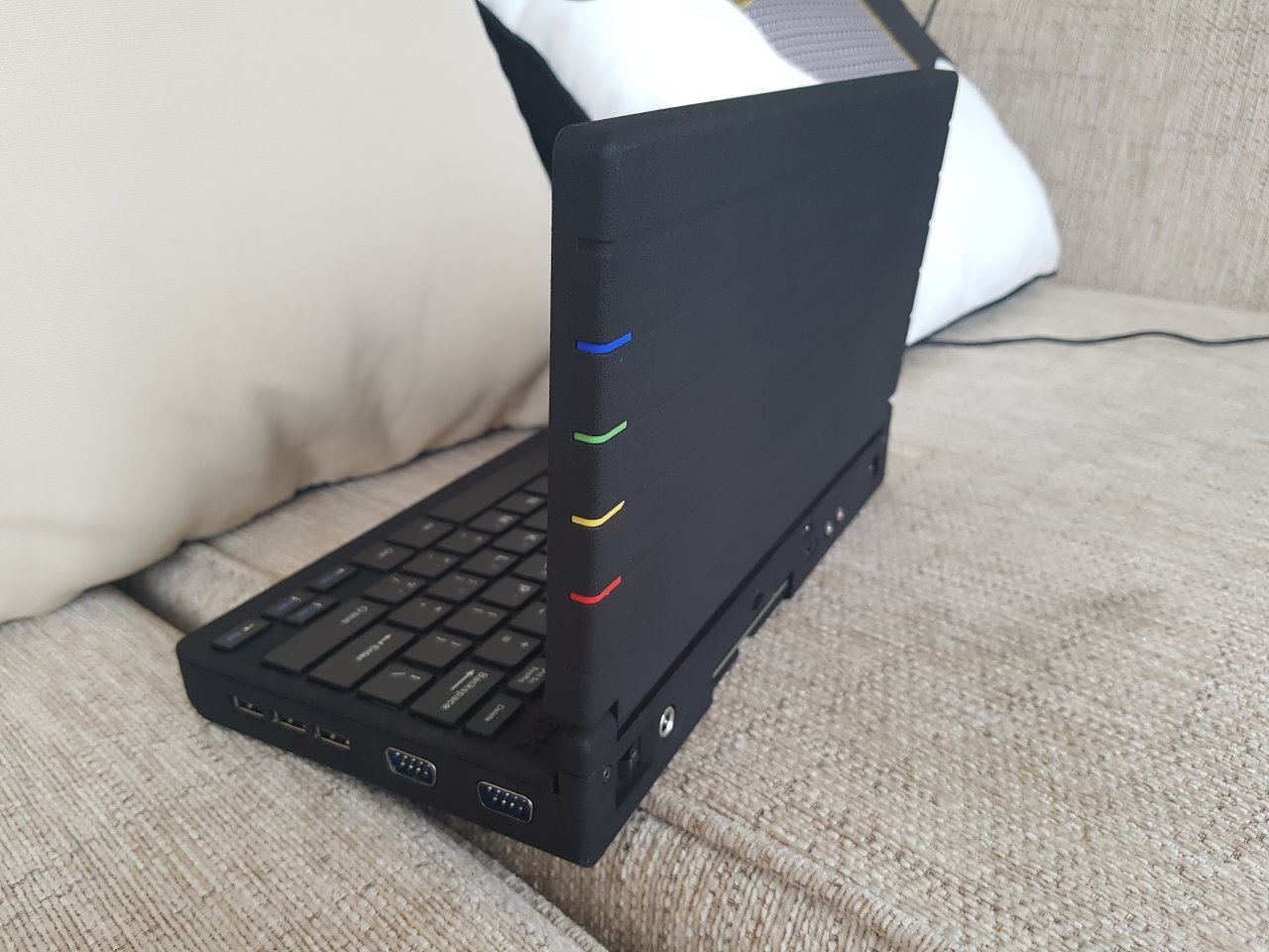 Thanks to a USB hub and a Raspberry Pi Zero, the ZX Spectrum Next Laptop has three external USB ports to the right and an OS-packing SD card slot to the rear