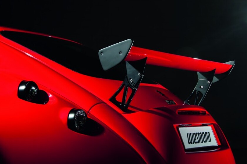 An aggressively poised spoiler helps redirect air accordingly