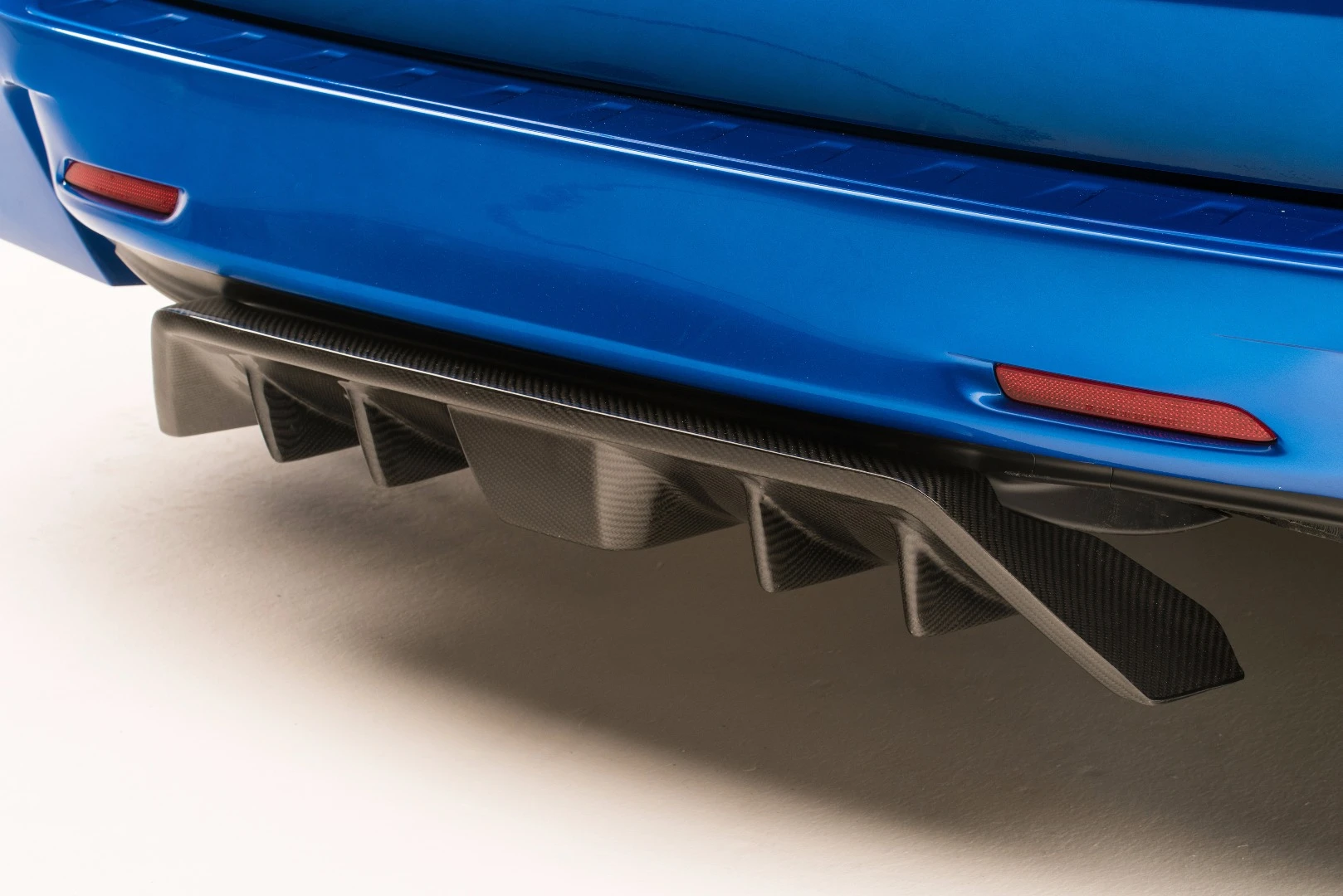 A rear diffuser is one of the additions
