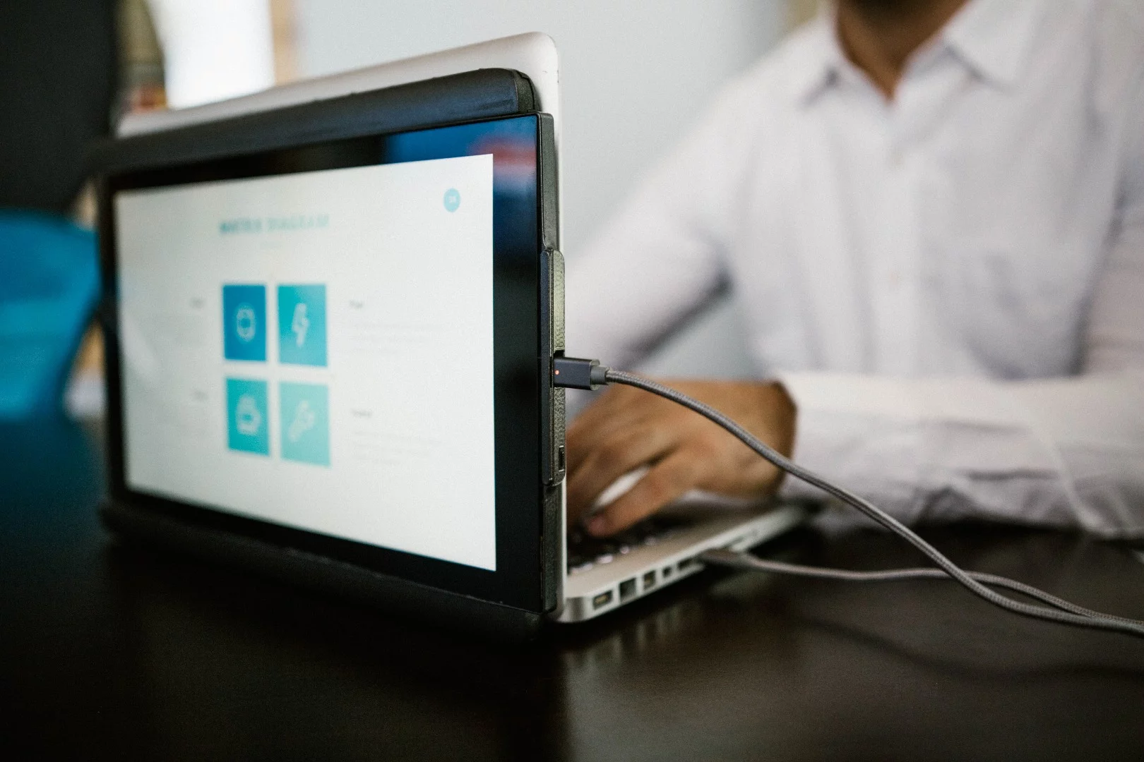 Duo's screen can be flipped back around on itself, so that it's facing out from the back of the laptop