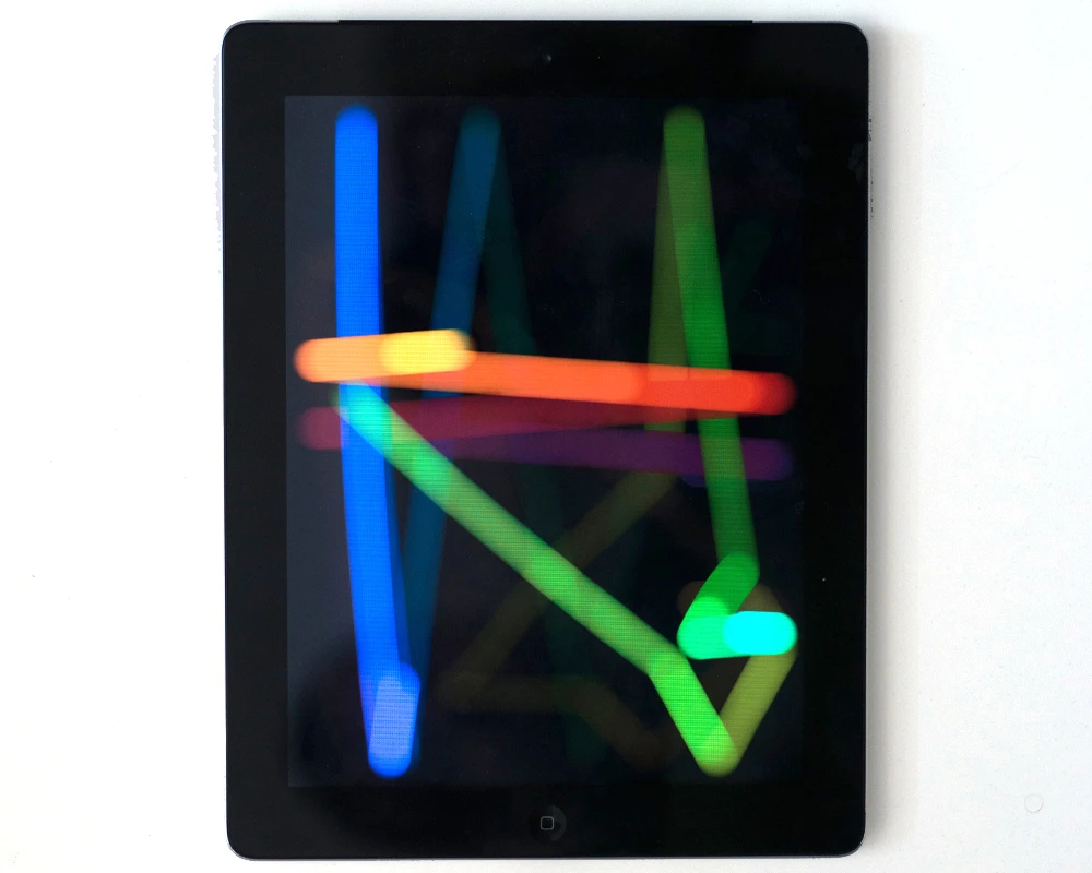 Balls is a deceptively simple app in which a number of colored balls bounce around the screen making wind-chime-like noises and they hit each other