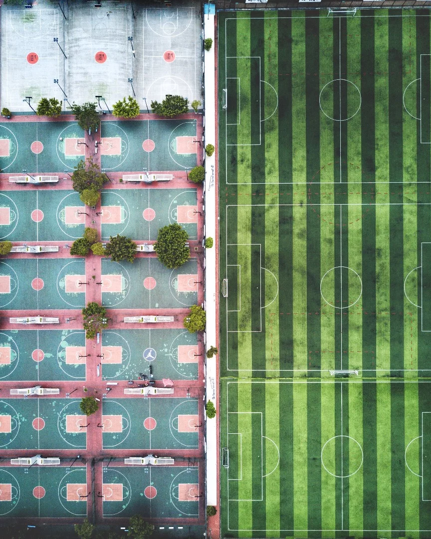 This playground which combines both a football field and basketball courts, taken in Guangzhou
